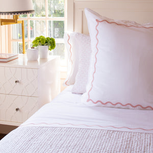 The Erin Gates x Kassatex collection featuring the Iris Block Quilt, Iris Block Shams and matching Ripple Bedding in hues of blush